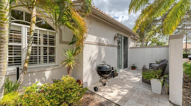 view of patio / terrace featuring fence