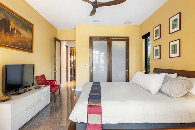 bedroom featuring ceiling fan and visible vents