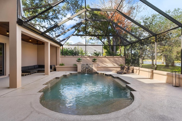 pool with a ceiling fan, a lanai, a patio area, and an outdoor living space