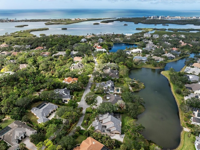 aerial view with a residential view and a water view