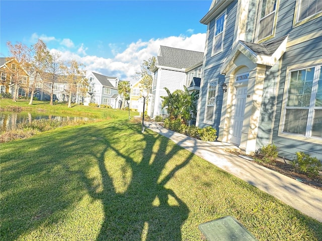 view of yard with a residential view