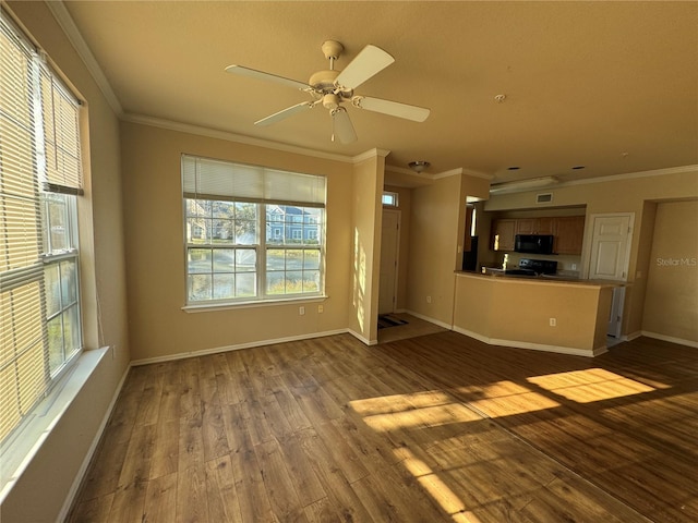 unfurnished living room featuring baseboards, ceiling fan, dark wood-type flooring, and crown molding