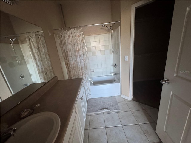 full bathroom featuring tile patterned flooring, shower / bath combo, and vanity