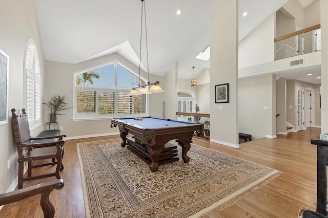 playroom featuring baseboards, visible vents, wood finished floors, pool table, and high vaulted ceiling