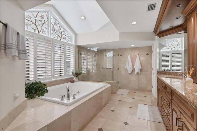 full bath featuring visible vents, a tub with jets, tile patterned flooring, vanity, and a shower stall