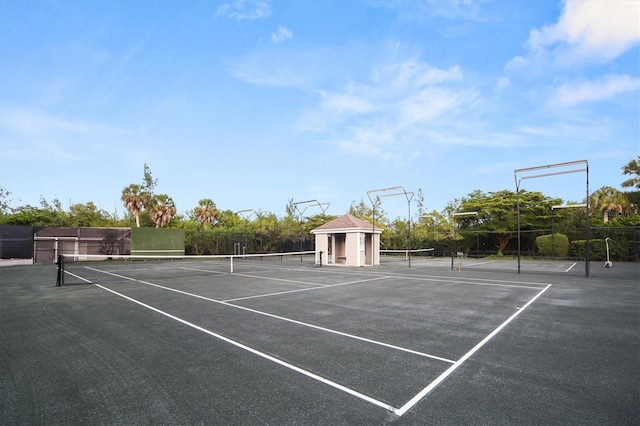 view of sport court with fence