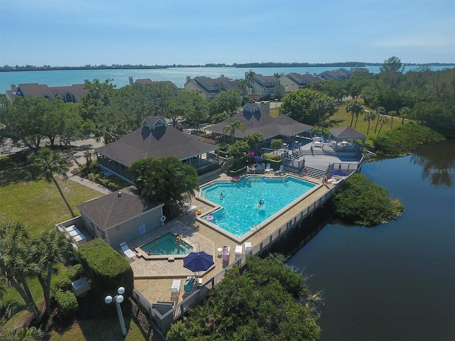 drone / aerial view with a water view