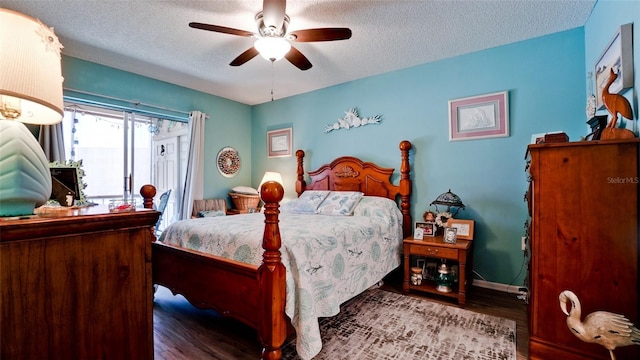 bedroom featuring a textured ceiling, wood finished floors, a ceiling fan, and access to outside