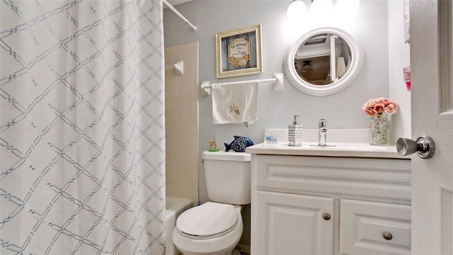 full bathroom with toilet, shower / tub combo with curtain, and vanity