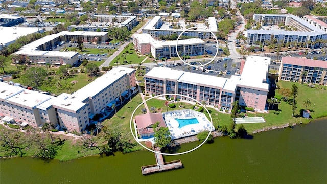 4133 Heron Way Unit E202, Bradenton, FL 34205 - bird's eye view of apartment complex, a large body of water, and a pool area