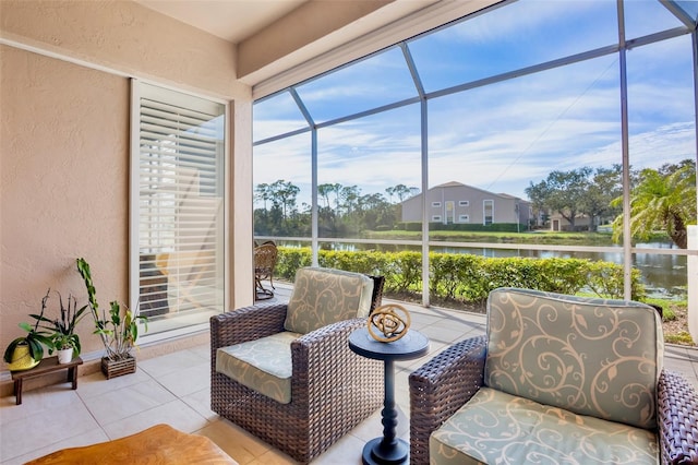 sunroom with a water view