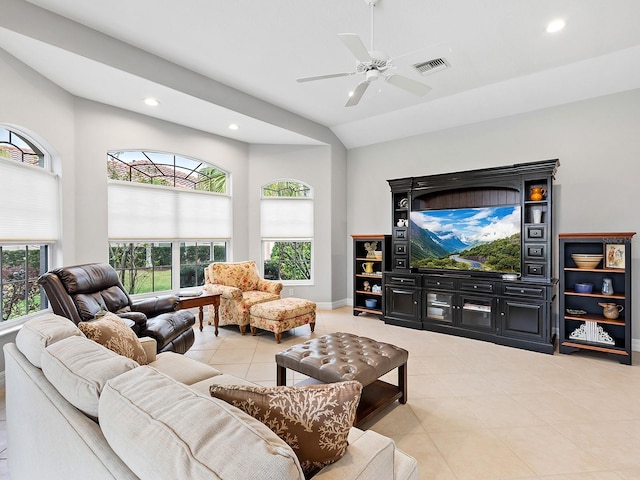 living room with tile patterned flooring, visible vents, vaulted ceiling, and recessed lighting