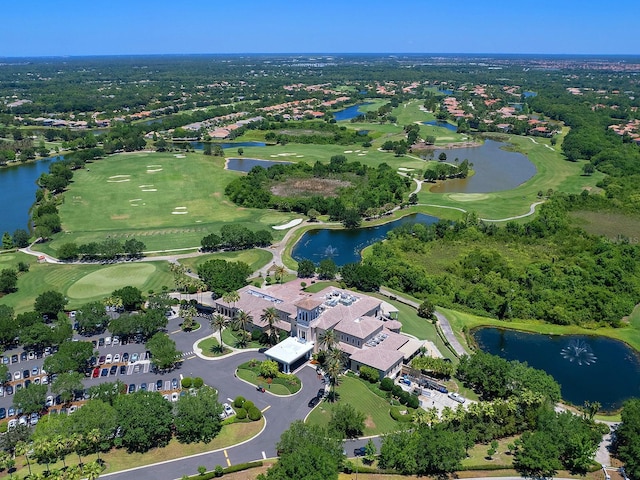 drone / aerial view featuring a water view and golf course view