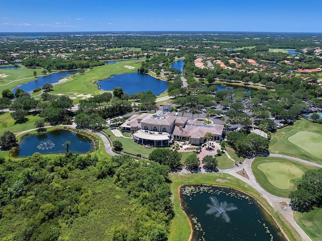 birds eye view of property featuring a water view and view of golf course