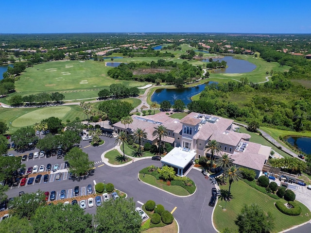 bird's eye view featuring view of golf course and a water view