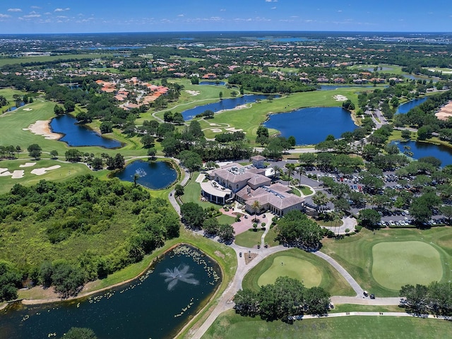 bird's eye view featuring a water view and golf course view