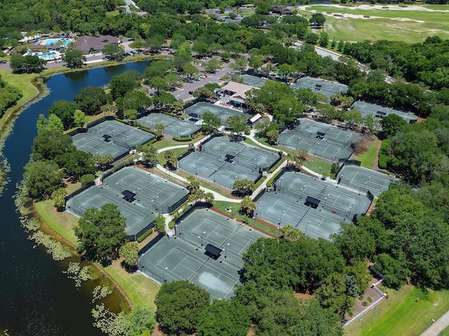 birds eye view of property with a water view