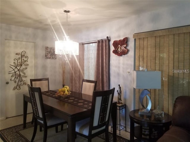 dining room with an inviting chandelier