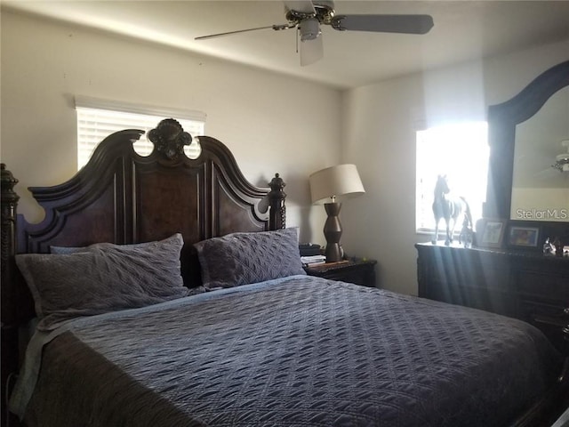 bedroom featuring ceiling fan