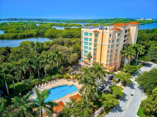 birds eye view of property featuring a water view