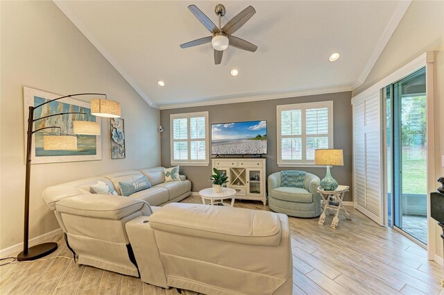 11607 Meadowgate Pl, Bradenton, FL 34211 - living area with ceiling fan, lofted ceiling, light wood-style floors, and ornamental molding