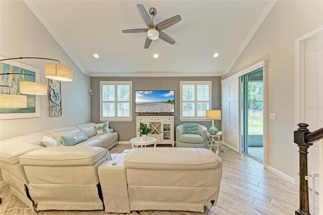 11607 Meadowgate Pl, Bradenton, FL 34211 - living area featuring light wood-style flooring, crown molding, ceiling fan, and vaulted ceiling