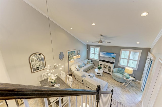 11607 Meadowgate Pl, Bradenton, FL 34211 - living room with baseboards, crown molding, a ceiling fan, and wood finished floors