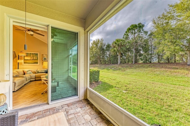 11607 Meadowgate Pl, Bradenton, FL 34211 - sunroom with lofted ceiling and a ceiling fan