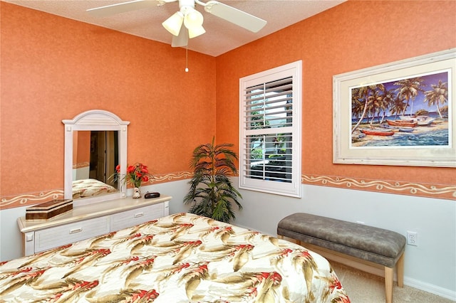 carpeted bedroom with a ceiling fan