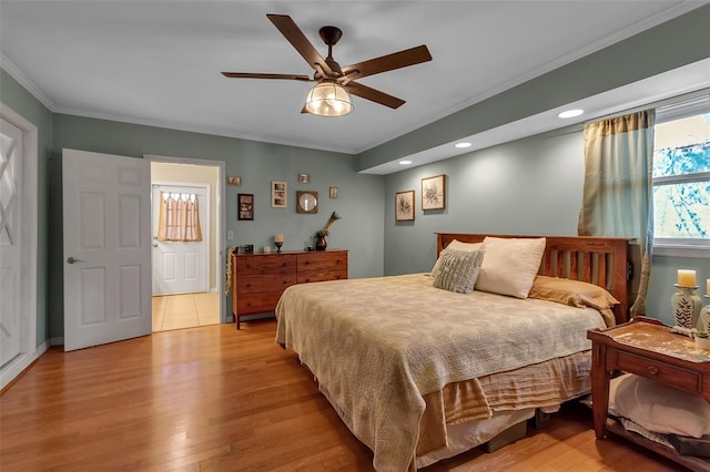 bedroom with ornamental molding, recessed lighting, light wood-style floors, and ceiling fan