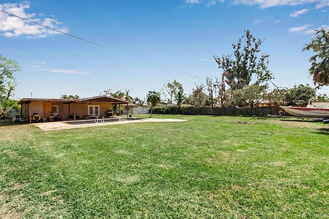 view of yard with a patio area and fence