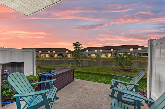 view of patio featuring a water view