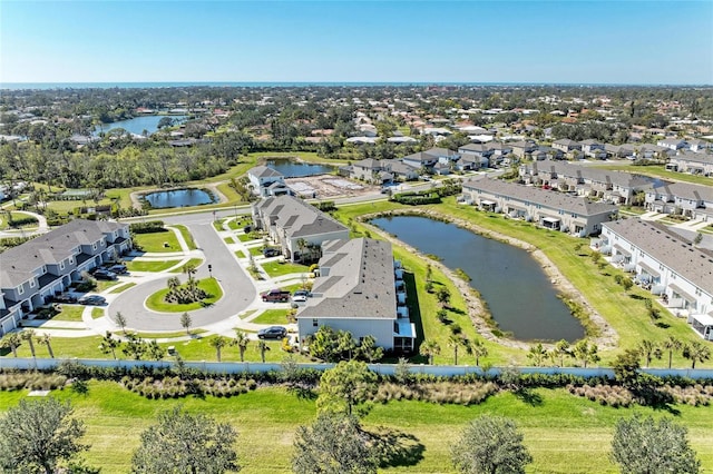 aerial view with a water view and a residential view