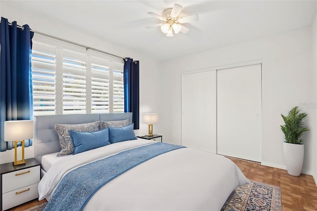 bedroom featuring a ceiling fan and a closet