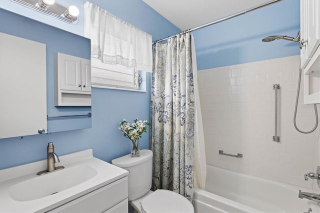 full bathroom with vanity, shower / bath combination with curtain, and toilet