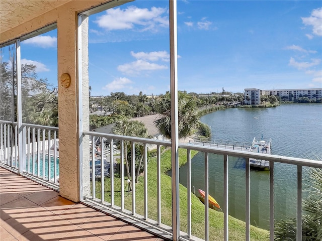 balcony featuring a water view