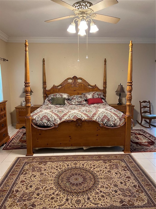 bedroom with tile patterned flooring, ceiling fan, and crown molding