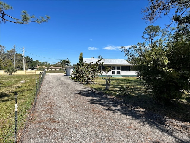 view of road with driveway