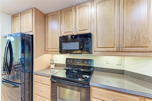 kitchen with a textured ceiling, black appliances, and light brown cabinetry