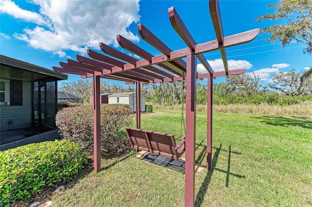 view of yard with a storage shed, an outbuilding, and a pergola