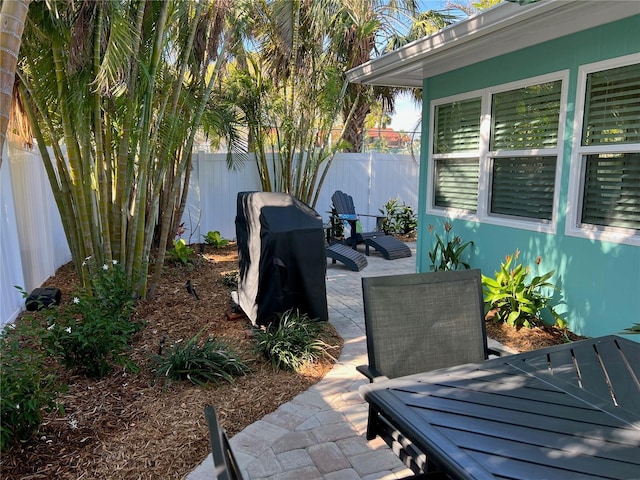 view of patio / terrace with fence and grilling area