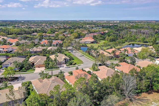 7762 US Open Loop, Lakewood Ranch, FL 34202 - aerial view of property's location with nearby suburban area and a large body of water
