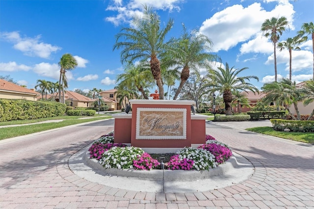 community sign with decorative driveway