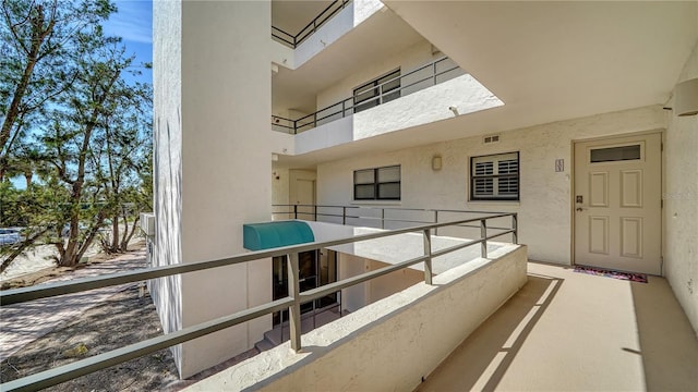 balcony featuring visible vents