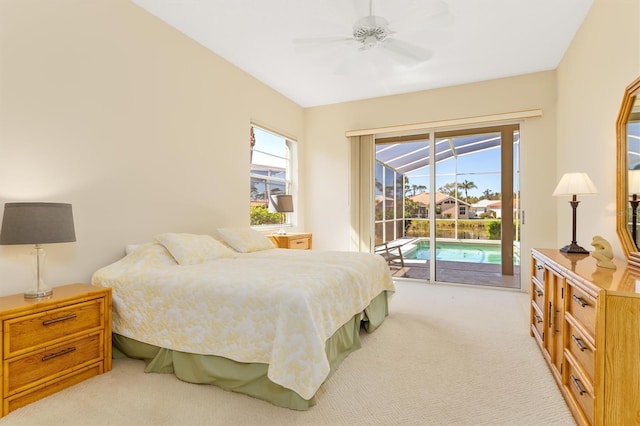 4173 Hearthstone Dr, Sarasota, FL 34238 - bedroom with a sunroom, a ceiling fan, light carpet, and access to exterior
