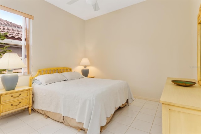 4173 Hearthstone Dr, Sarasota, FL 34238 - bedroom with ceiling fan and light tile patterned flooring