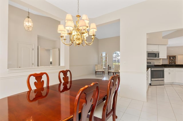 4173 Hearthstone Dr, Sarasota, FL 34238 - dining room with light tile patterned floors, a notable chandelier, and lofted ceiling
