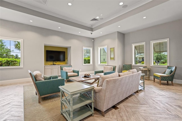 living room with recessed lighting, a raised ceiling, visible vents, and baseboards