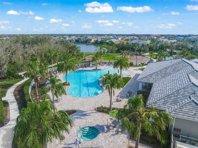 pool featuring a patio area and a community hot tub