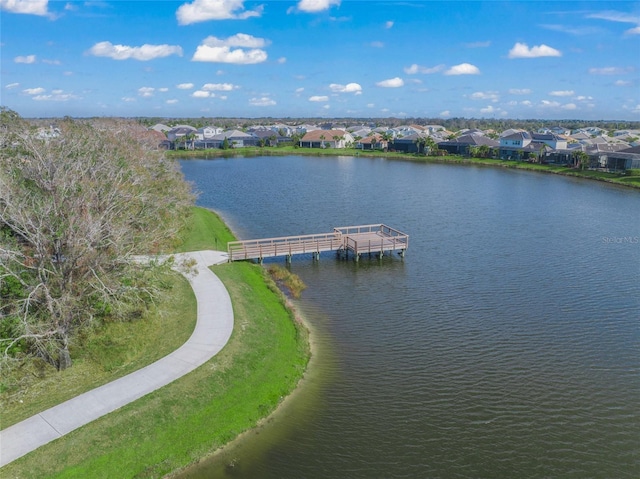 aerial view with a residential view and a water view